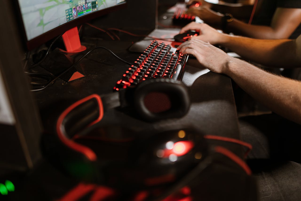 journey Close-up of gamers using mechanical keyboards during an intense esports session.